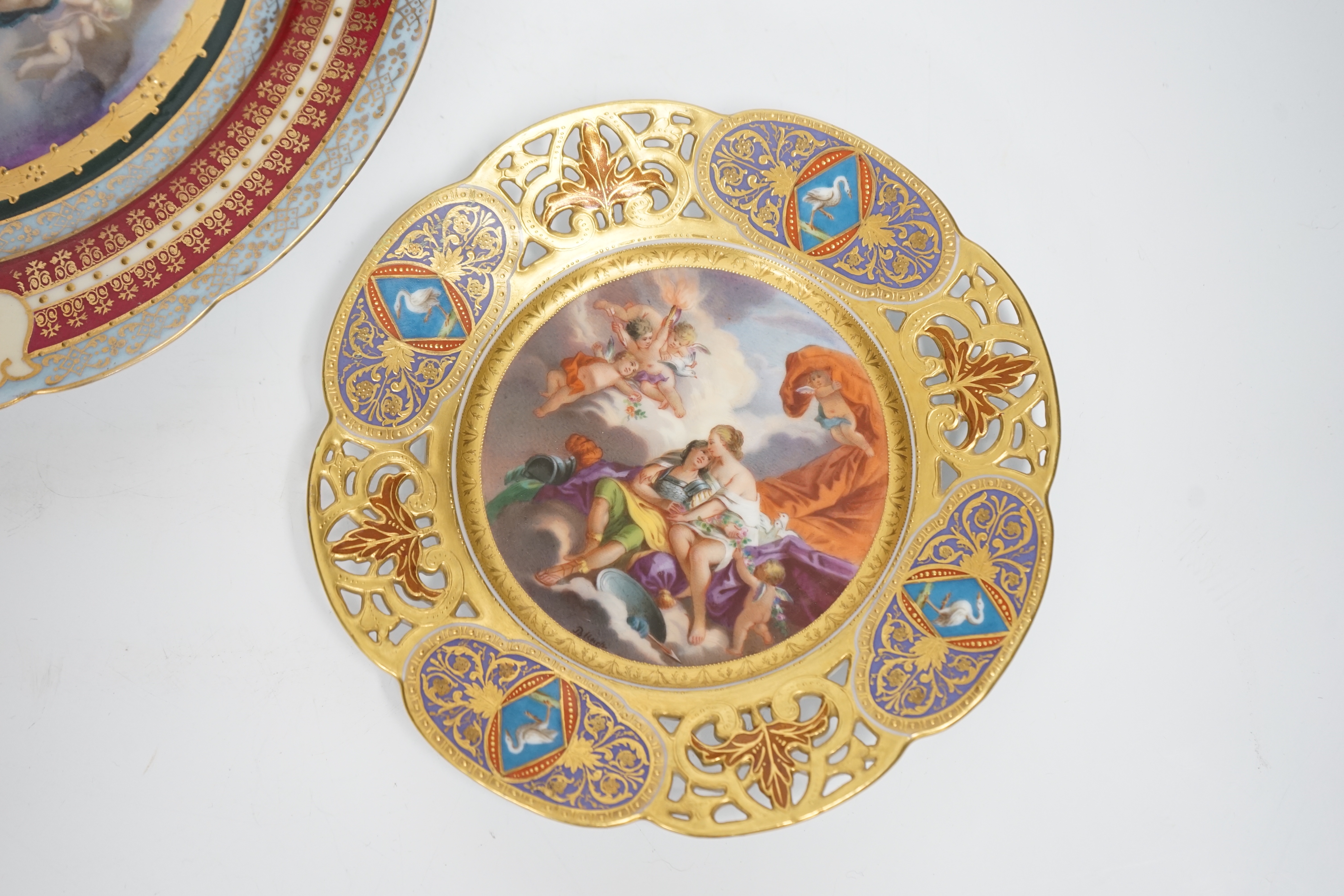 A late 19th century Vienna style “Mars and Venus “saucer and a Vienna style cabinet plate, largest 24cm diameter